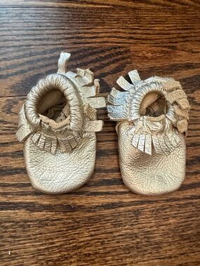 Freshly Picked Metallic Gold Fringe Baby Moccasins